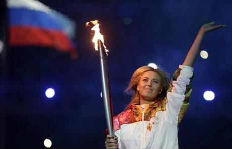 Russian tennis star Maria Sharapova carried the torch during the ceremony.
